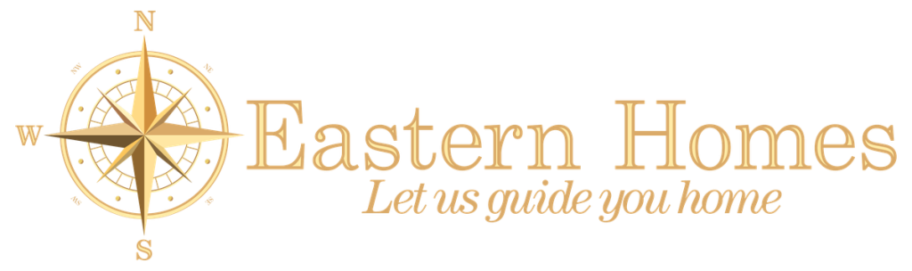 Eastern Homes compass rose logo in gold