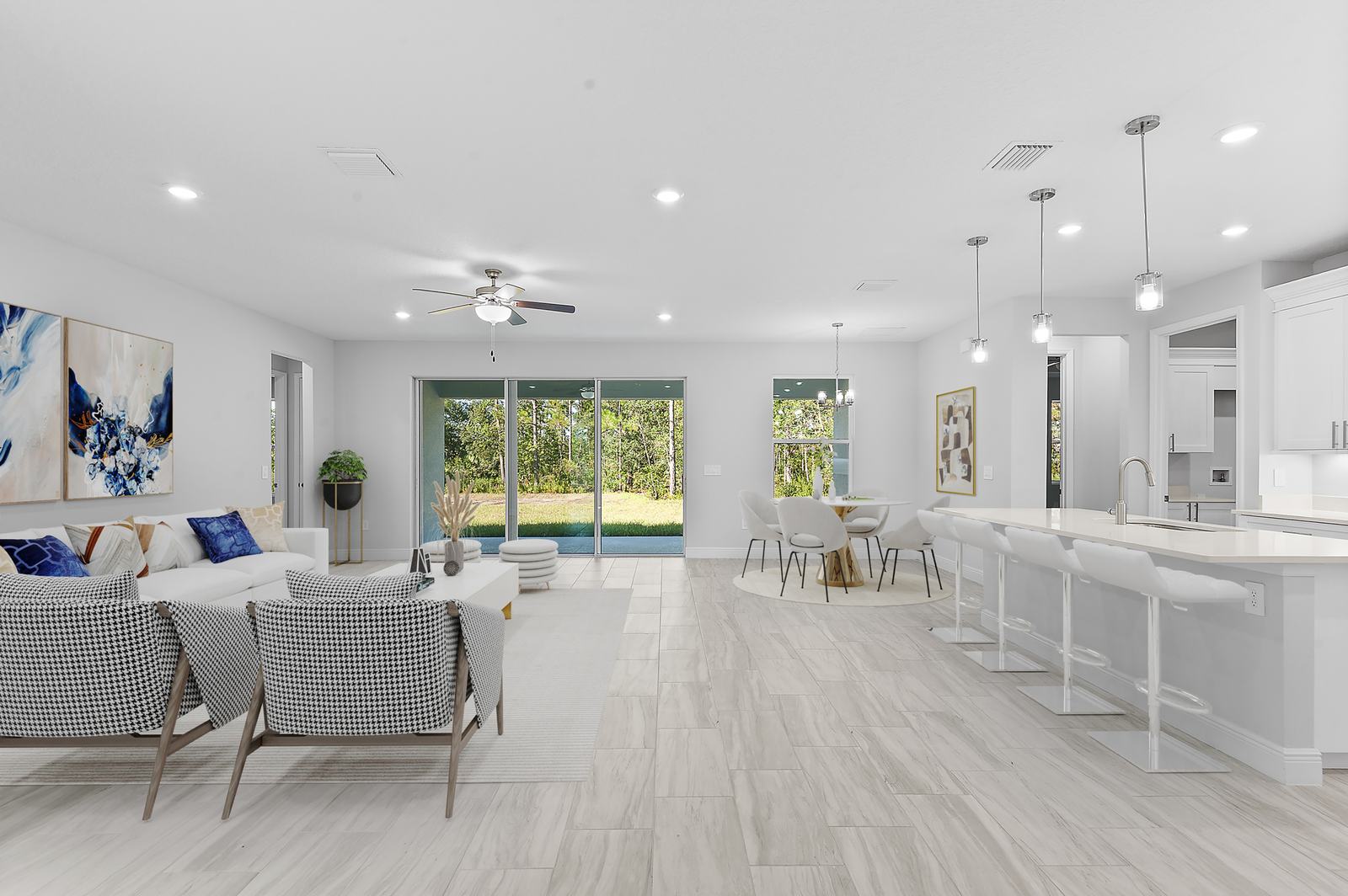 A custom Eastern Homes living space opening onto a pool lanai in Central Florida