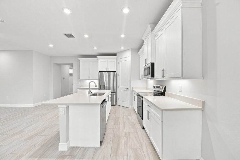 Kitchen island and cabinets at 1835 Wheeling Avenue, North Port