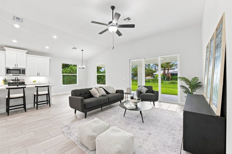 Great room with sliders to the yard at 4570 Oakley Road, North Port