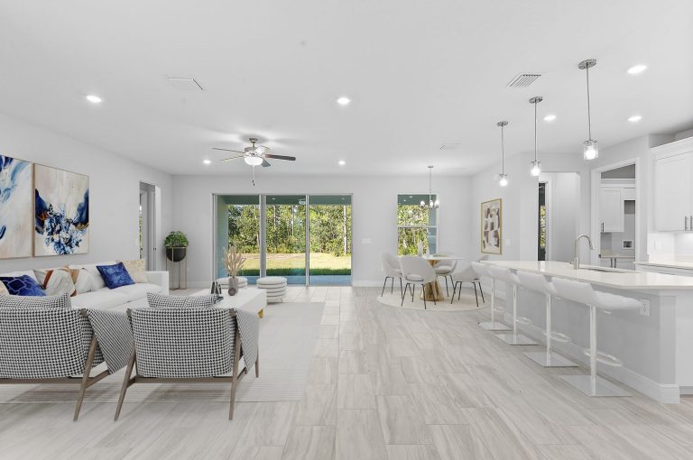 Living and dining area inside 18743 Overton Street, Wedgefield, Orlando