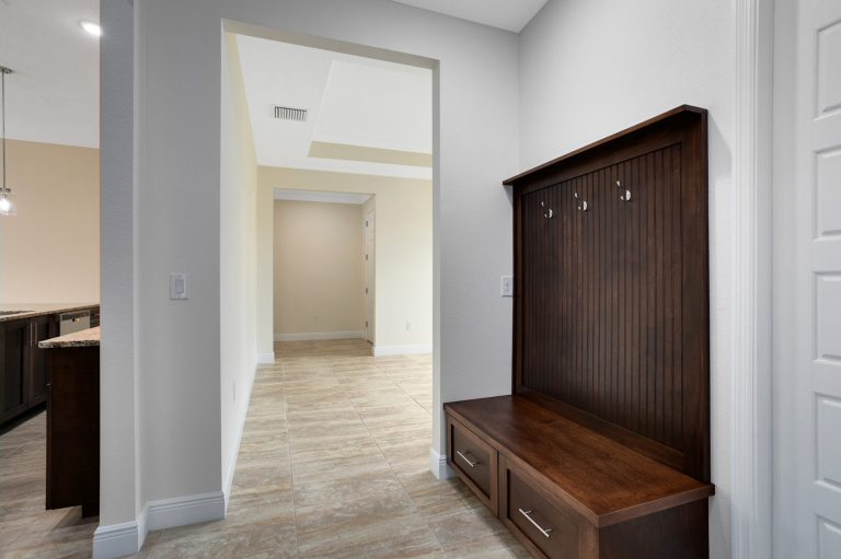 Built-in bench and storage at the entry of 20478 Netherland Street, Wedgefield